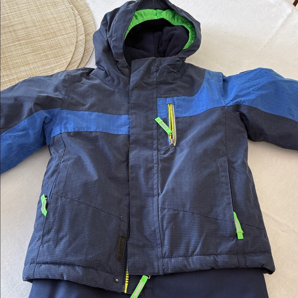 Boys warm snowsuit, Killtec brand, like new. Legs grow with child, let out hem.
